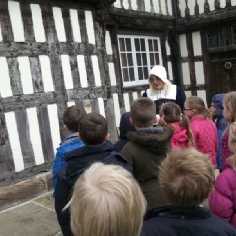 Children taking a tour of the hall