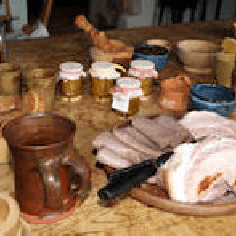 Various platters and jars of food and drink